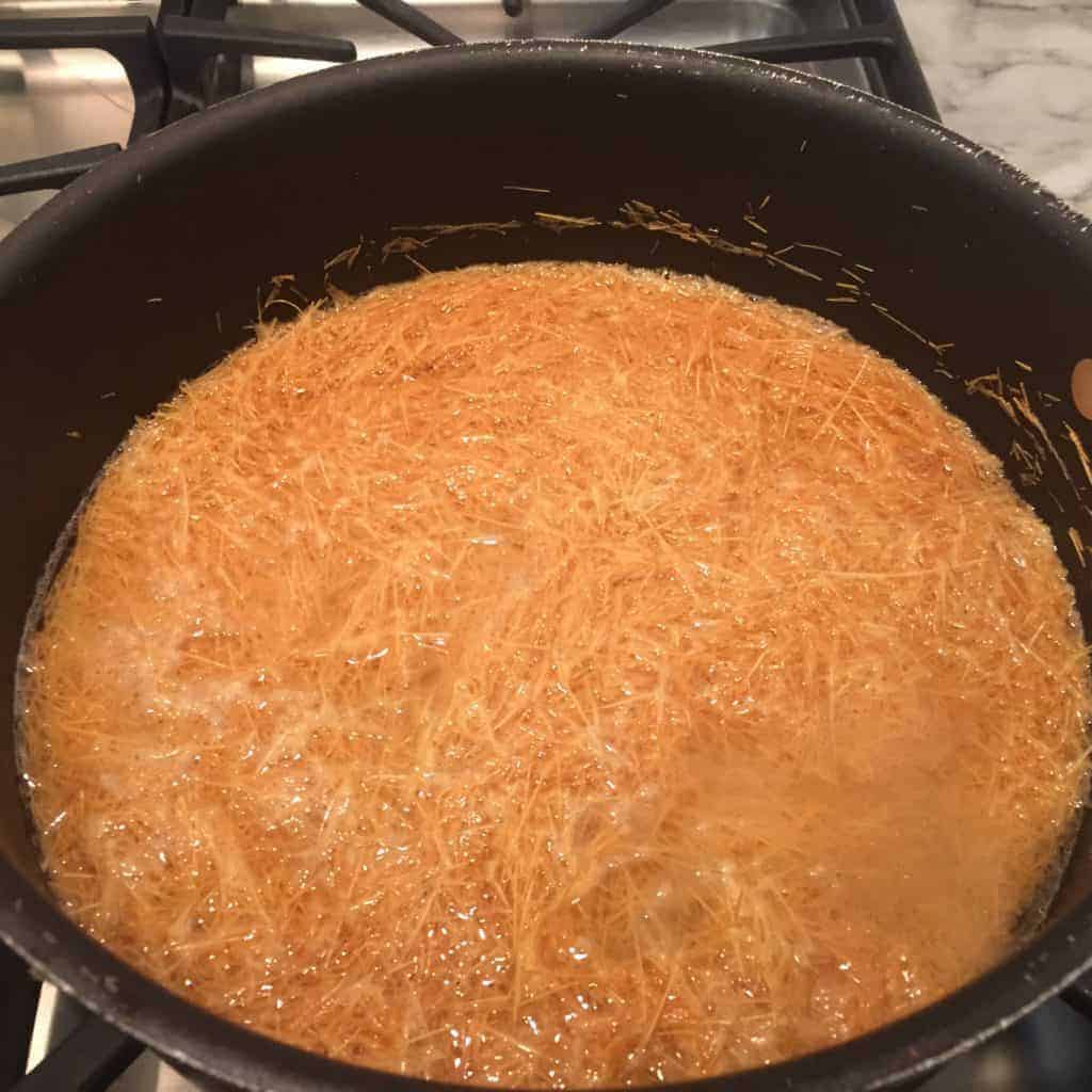 Water added to the roasted vermicelli in a non stick pan
