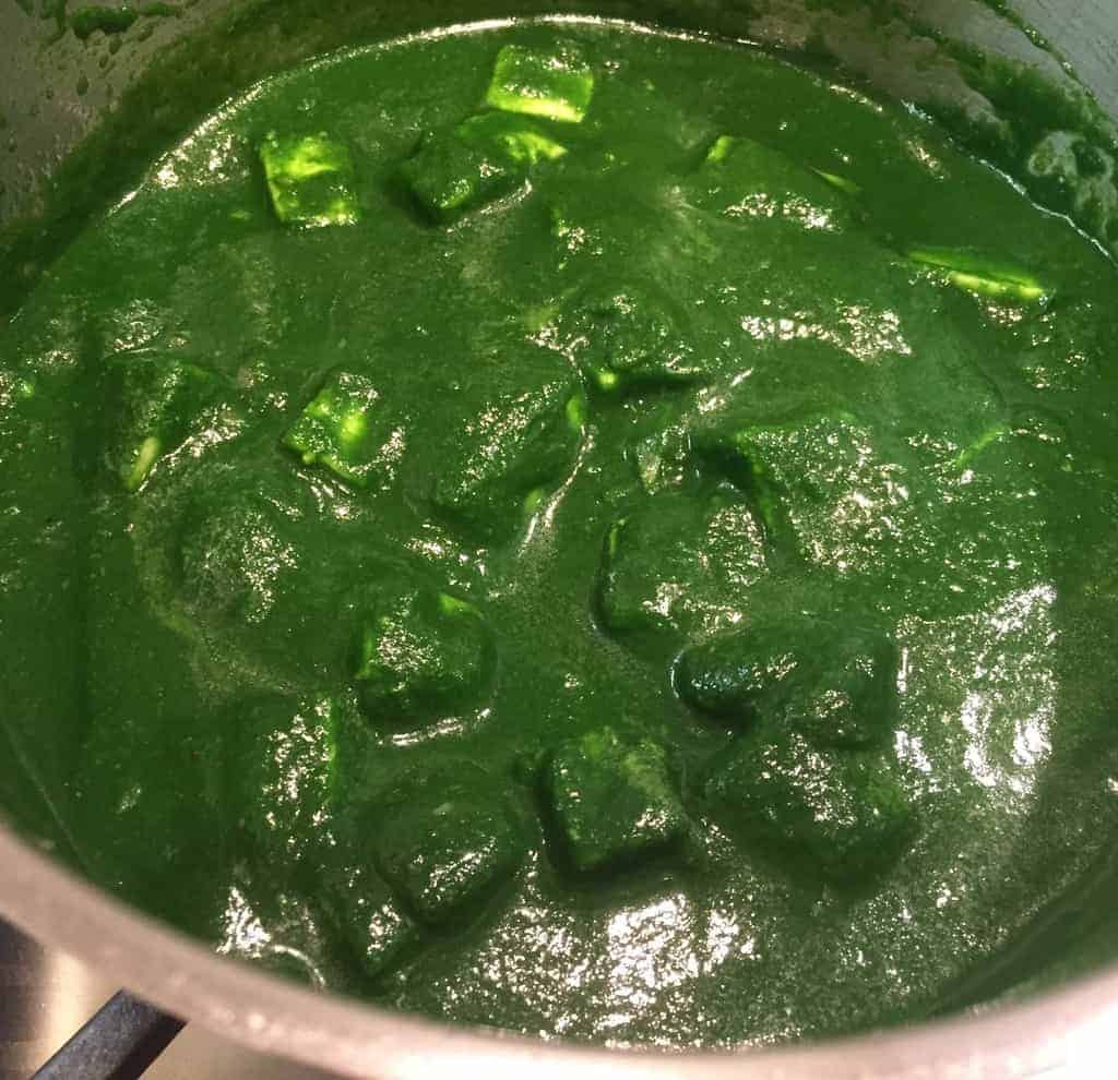 Palak Paneer in a stainless steel pot 