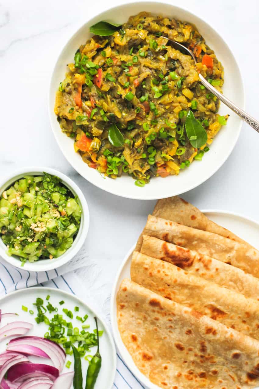 baingan bharta served with roti and raita