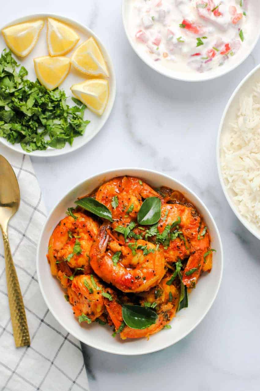 Malabar Shrimp Curry Served with, rice, raita and lemon wedges