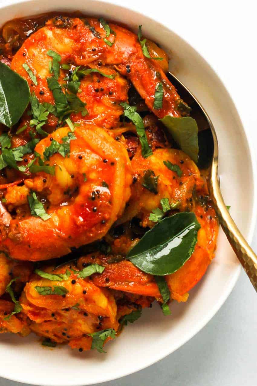 Shrimp curry in a white bowl