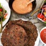 Purple Cabbbage Parathas in a platter with yogurt chutney and salad on the side