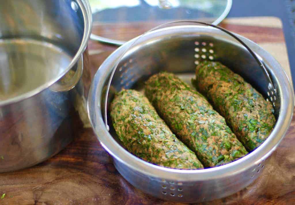 kothimbir vadi in steamer pot
