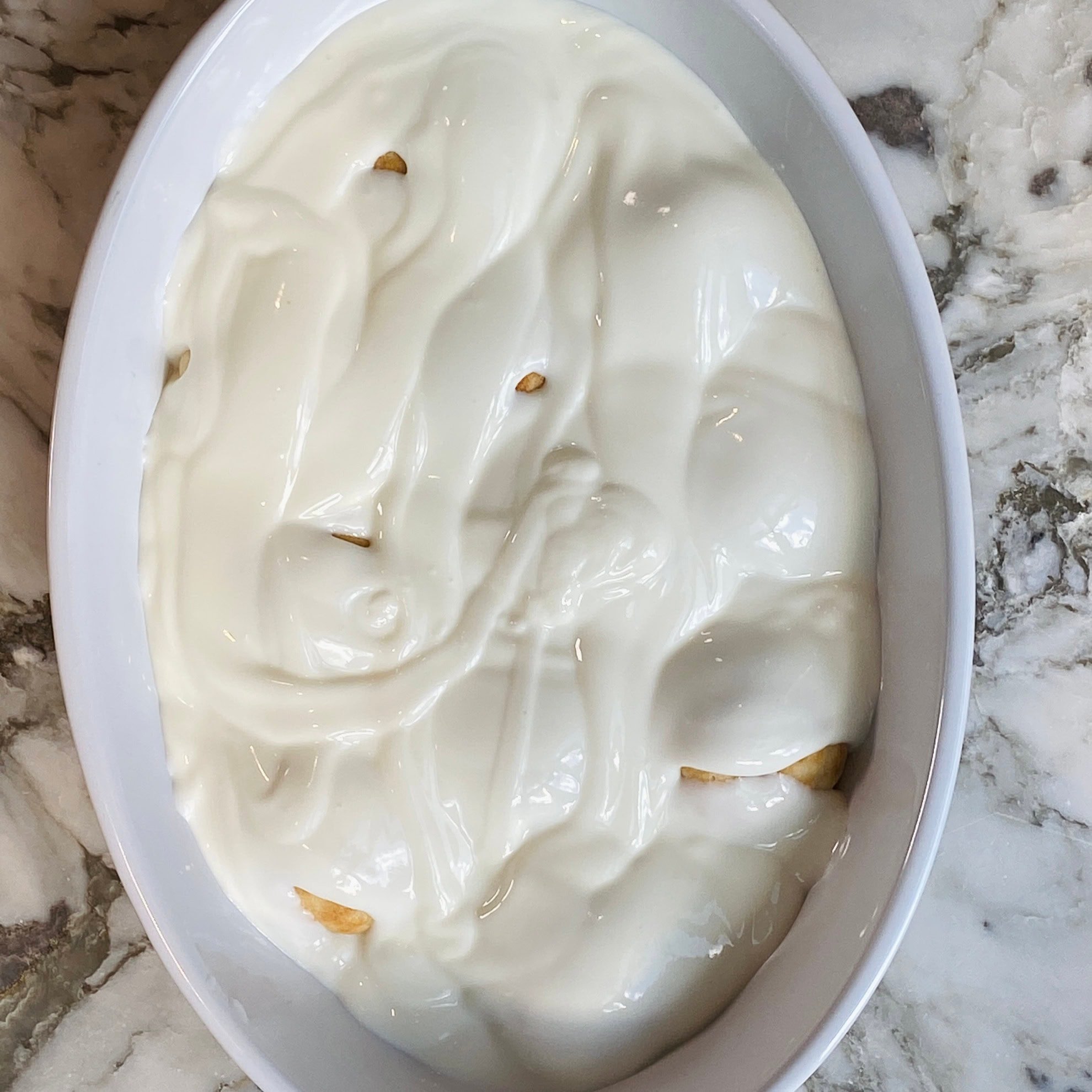 dahivada with seasoned yogurt on top