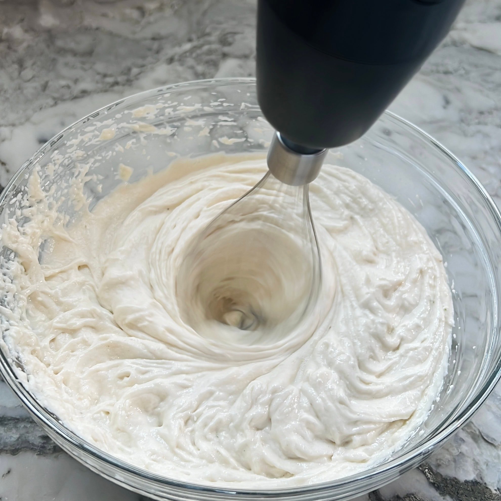 aerating vada batter with an electric whisk