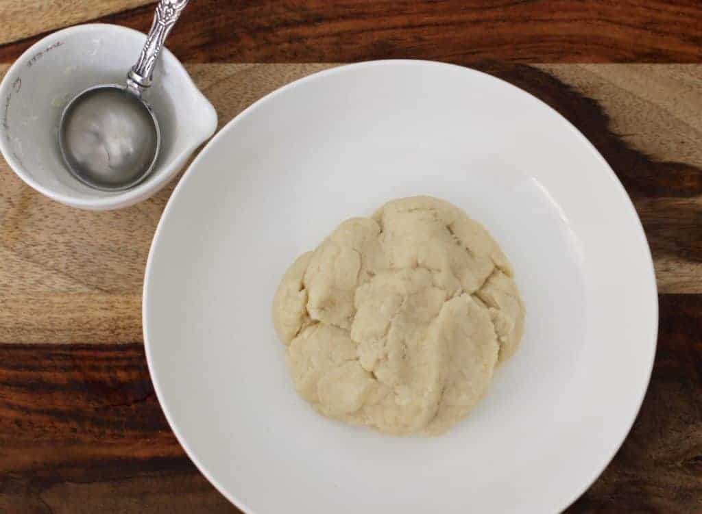 dough in a white bowl 