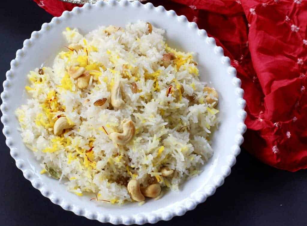 sweet coconut rice served in a white plate 