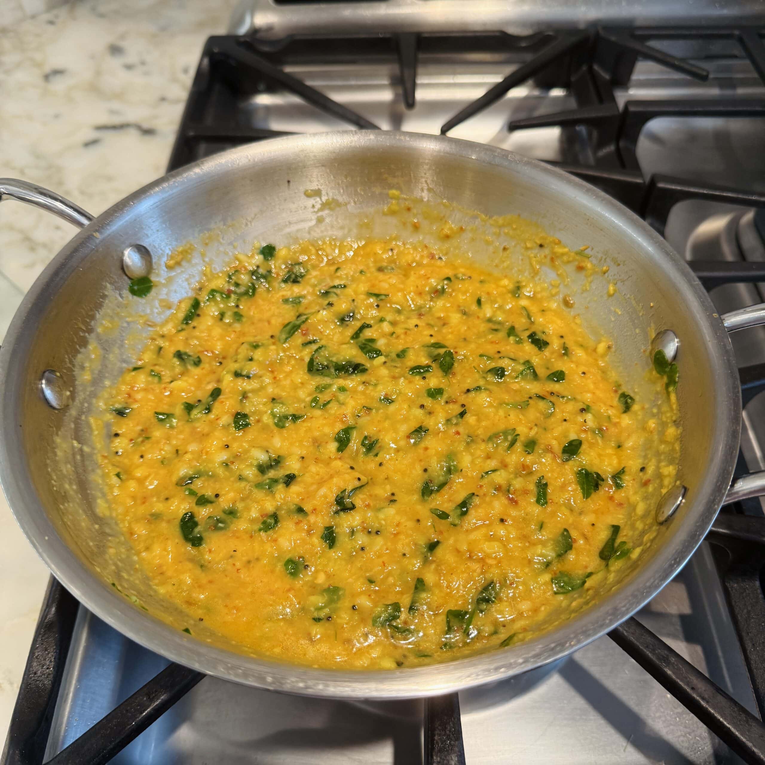 moringa dal simmering in a pan 