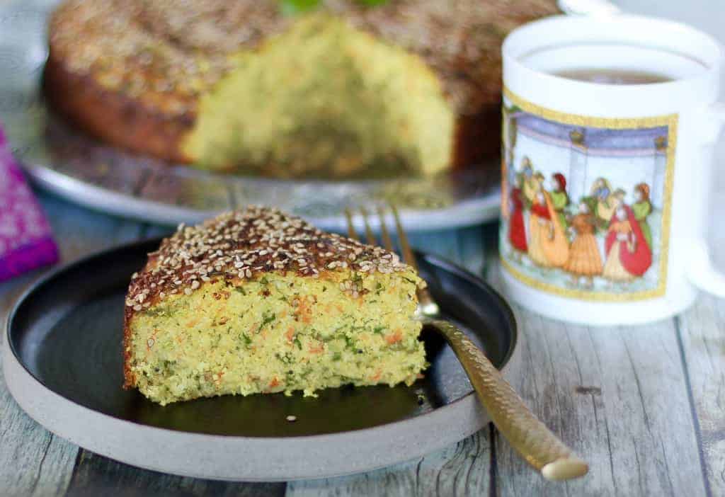 Slice of handvo with a cup of tea 