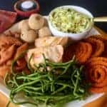 Platter filled with diwali sweets and savories
