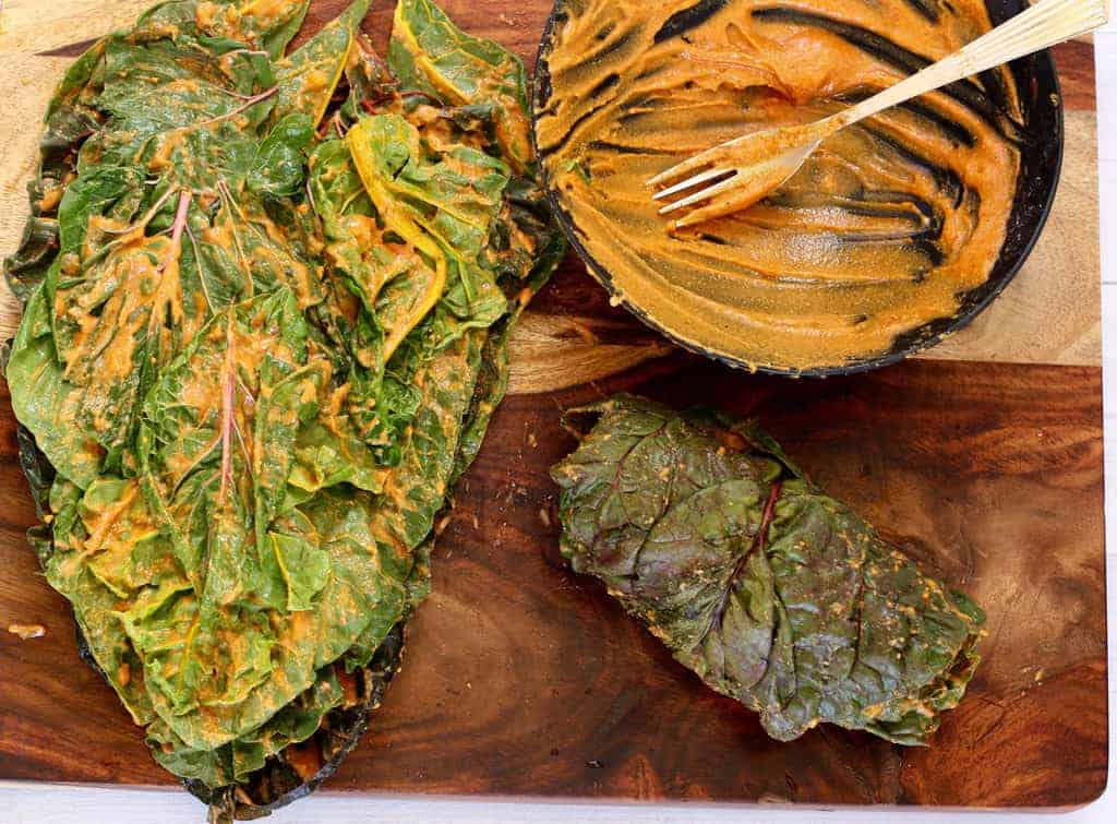 Swiss Chard leaves layered with gram flour paste and rolled for Aloo Wadi 