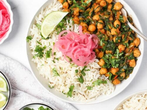 Chana Saag served with rice and pickled onions