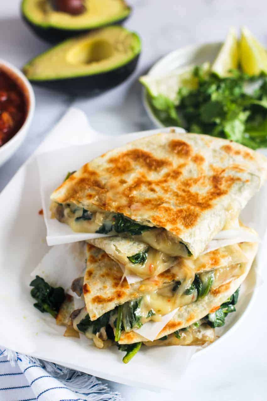 stack of spinach and mushroom quesadillas 