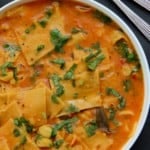Dal Dhokli served in a white bowl