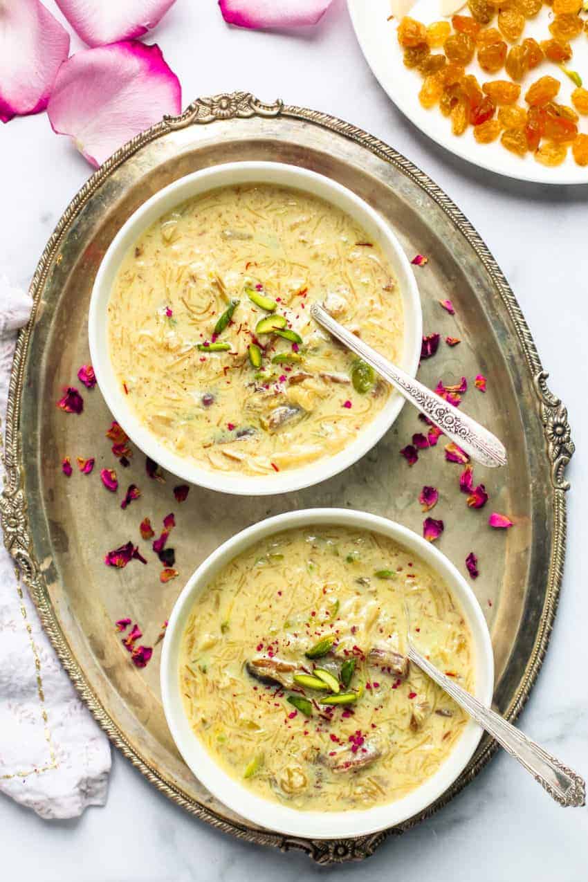 Sheer Khurma in 2 white bowls on a silver platter