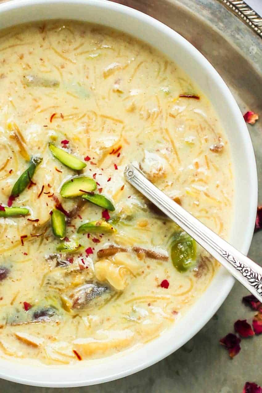 sheer khurma served in a white bowl 