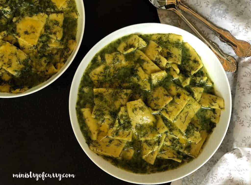 dill dhokli served in white bowls 