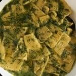 Dill Dhokli served in a white bowl