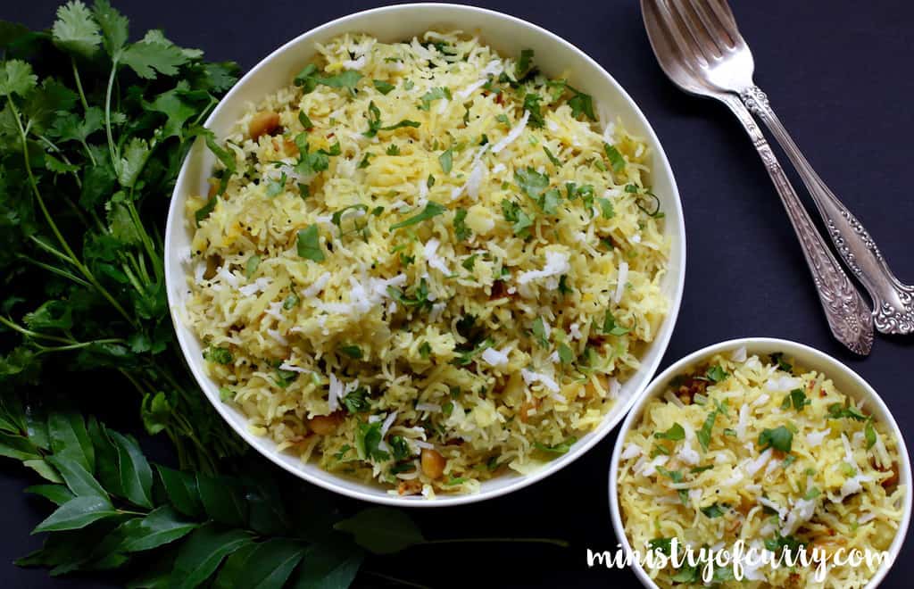 cabbage rice served in 2 white bowls