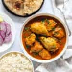 mom's chicken curry served with rotis and rice