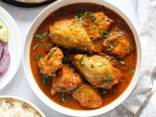 chicken curry served on a white bowl