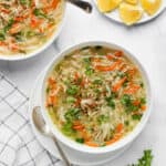 chicken cilantro soup served in a white bowl