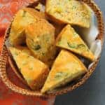 Jalapeno Cheddar Cornbread Sliced in a wicker basket