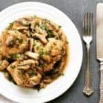 chicken marsala in a white plate