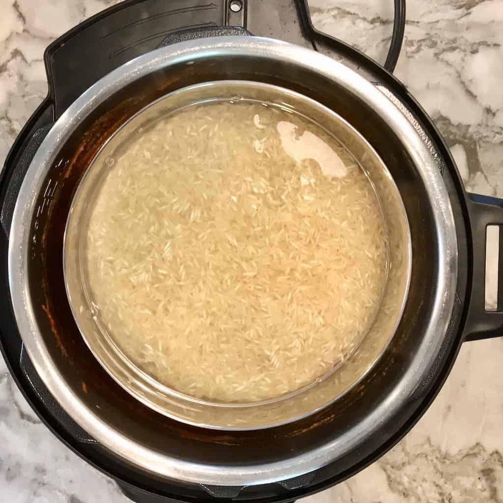 photos showing how to cook pot in pot rice with Shahi Chicken Korma