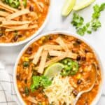 chicken tortilla soup served in 2 bowls