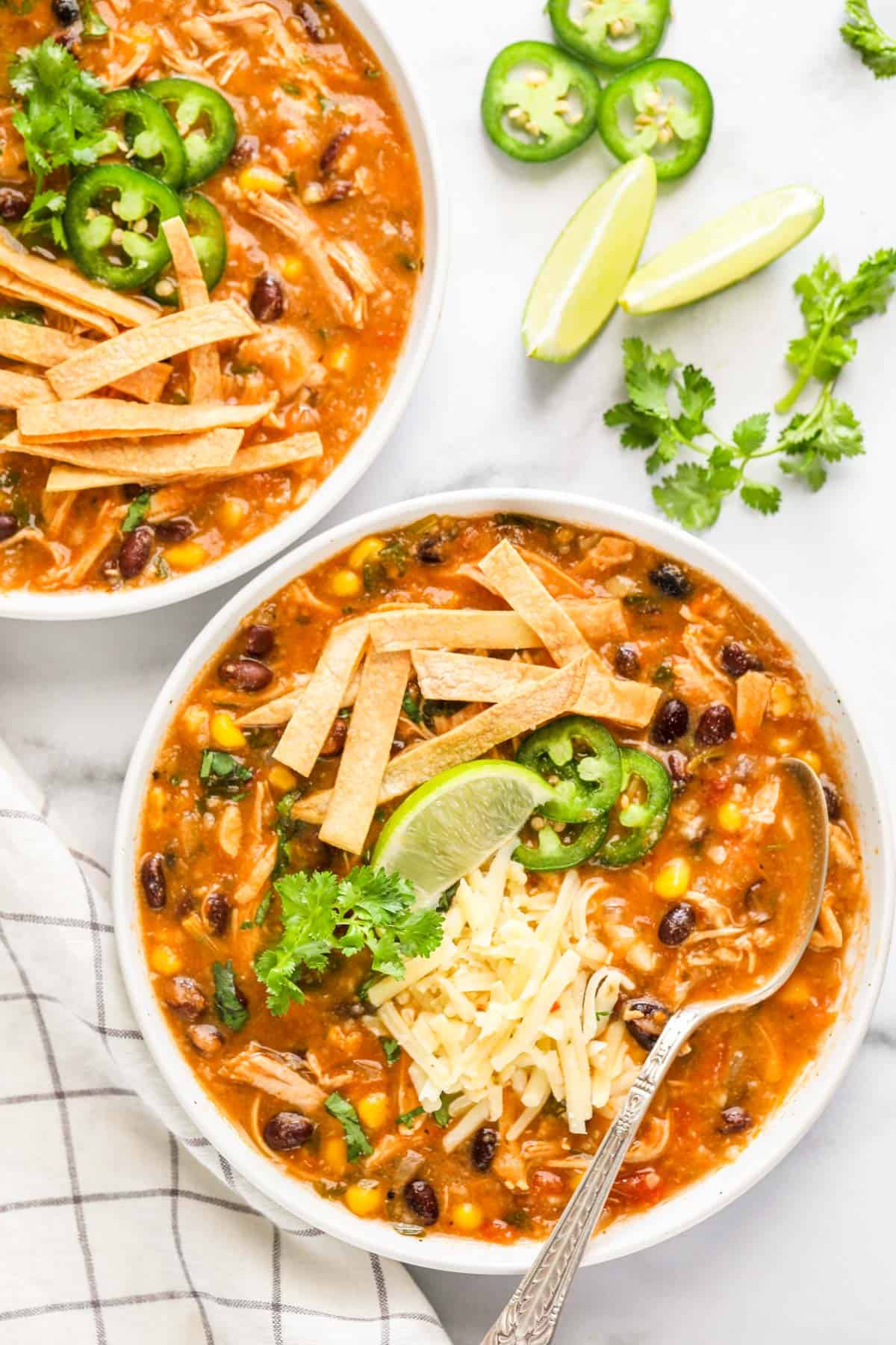chicken tortilla soup served in 2 bowls