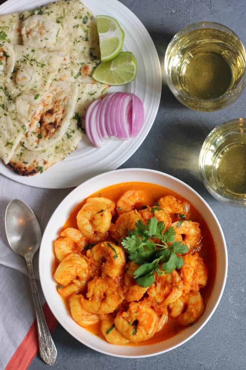 Shrimp curry served with naan