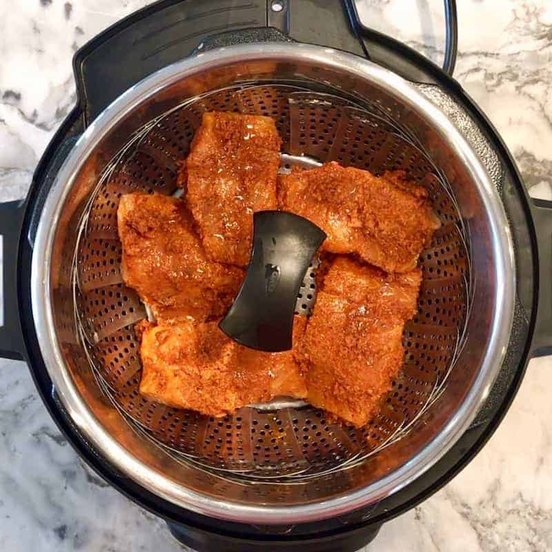 salmon in steamer basket in Instant Pot