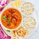 chicken tikka masala served with rice and naan