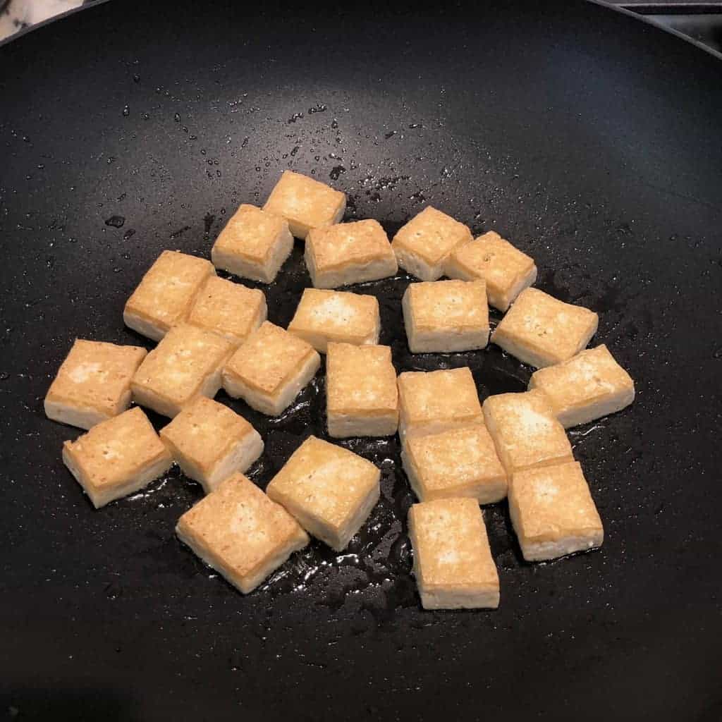 stir fried tofu in a pan