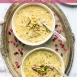 sheer khurma served in 2 silver bowls