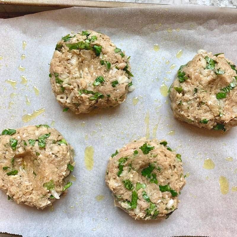 chicken burger patties ready to be baked
