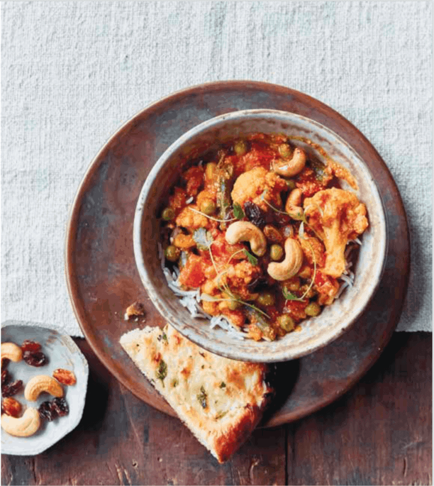 vegetable kurma served with rice and naan 