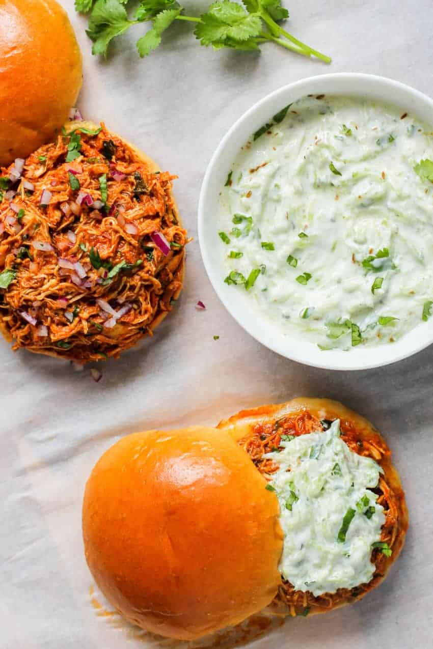 Pulled chicken sandwiches with cucumber rait on the side