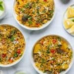 Masale Bhath serevd in 3 bowls with cooling drink on tne side
