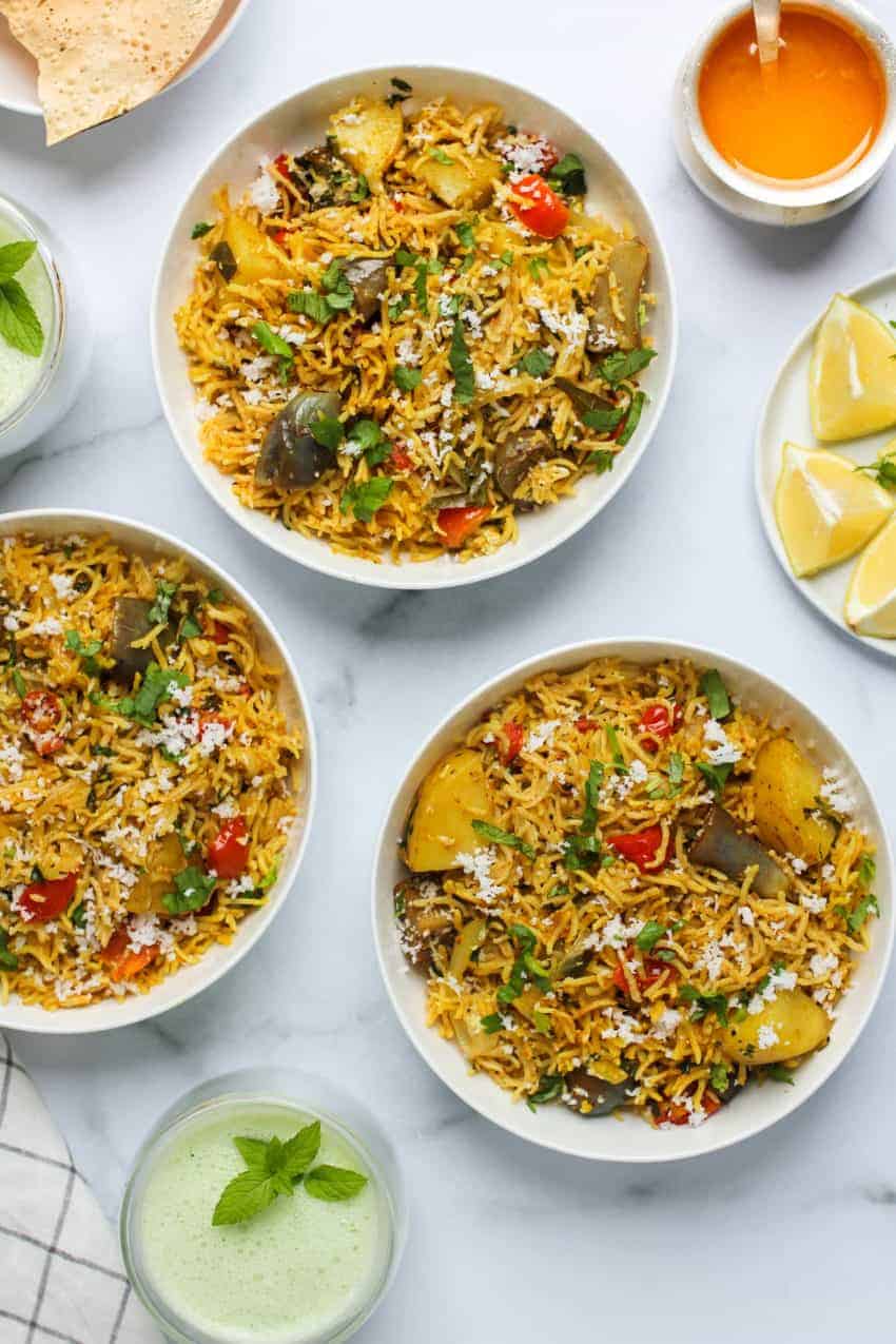 Masale Bhath Served in 3 bowls with yogurt drink