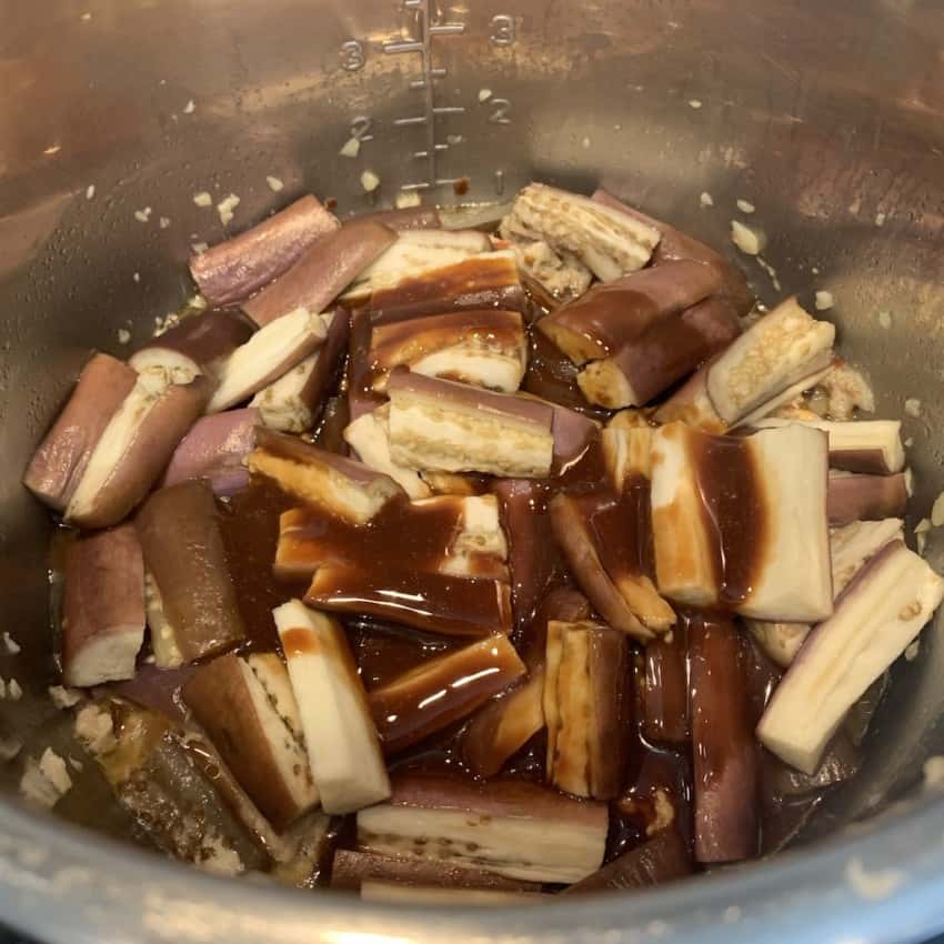 soy sauce & oyester sauce over cooked chicken and eggplant 