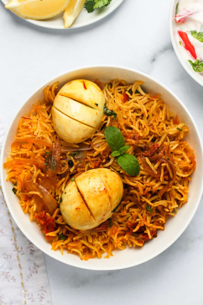 Egg Biryani served in a white bowl