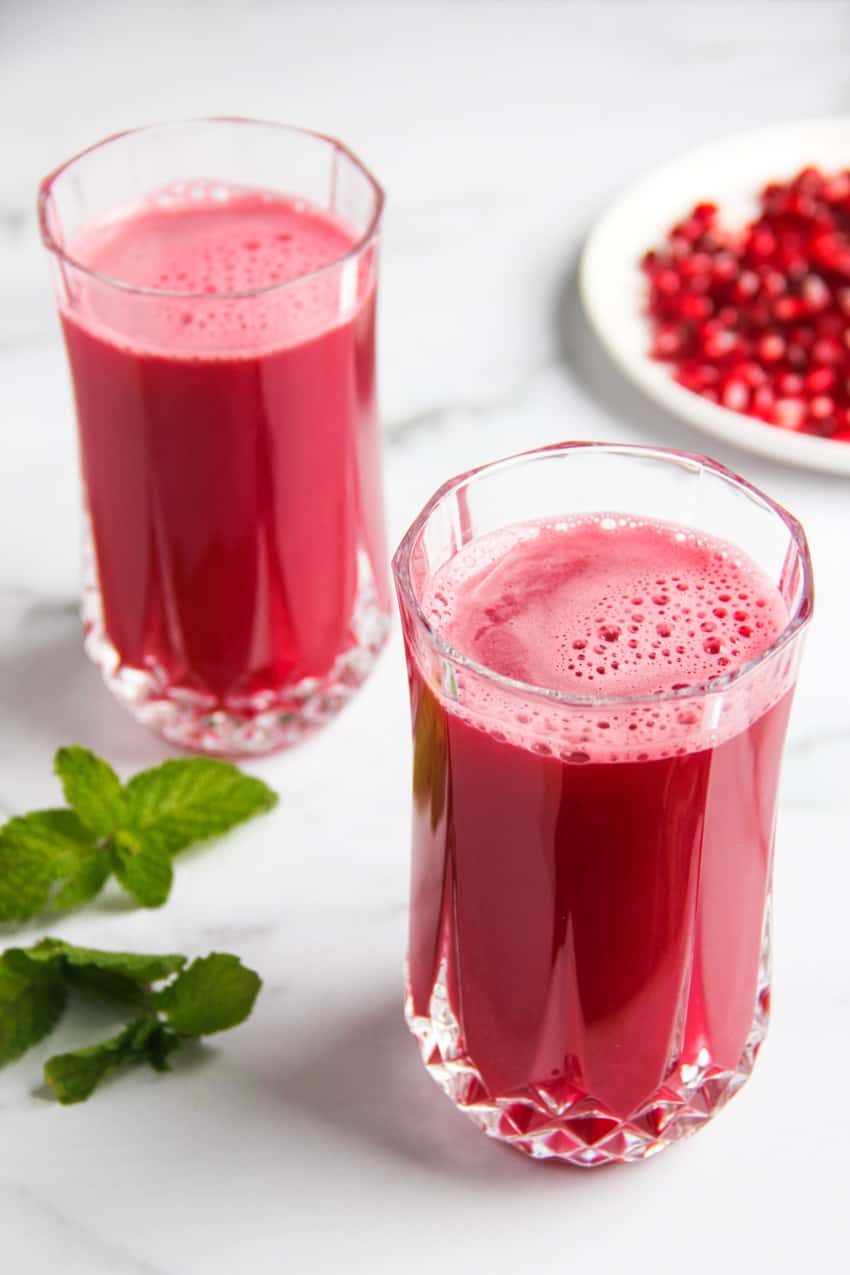 Cups full of the best pomegranate juice recipe ever
