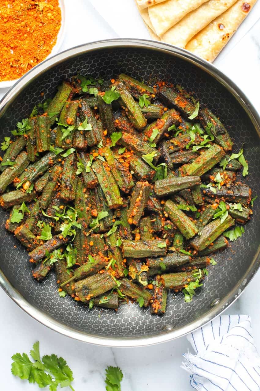 cooked bharwa bhindi in a frying pan 