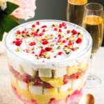 A show stopper dessert, this no-cook Raspberry Trifle is layered with light angel food cake, cardamom & saffron infused pudding, pistachios and cream.