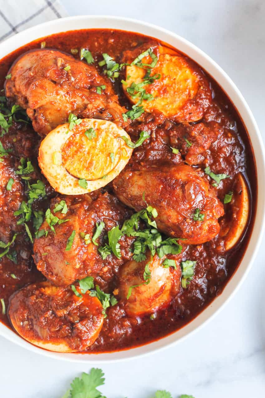 doro wat garnished with cilantro 