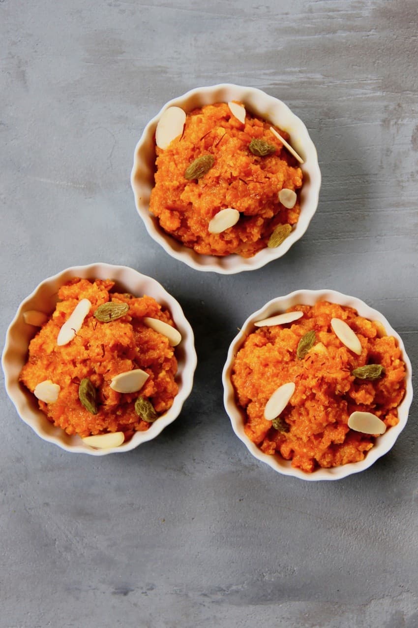 Gajar Halwa served in 3 white bowls 