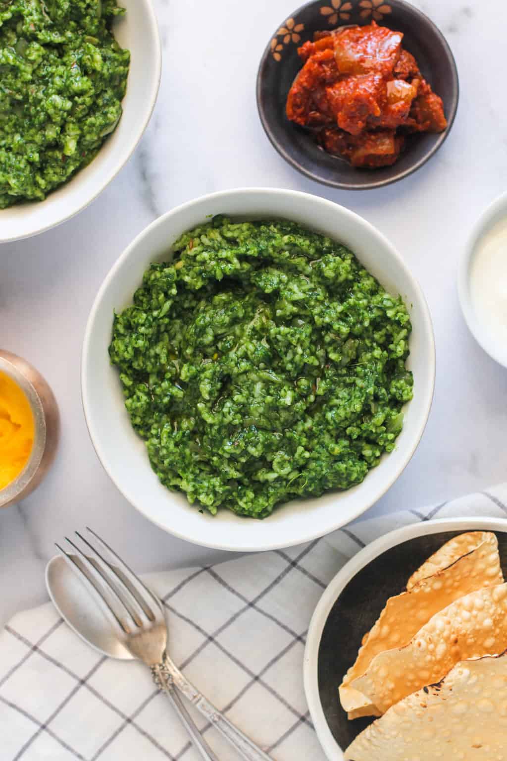 Palak Khichdi served with pickle and papad