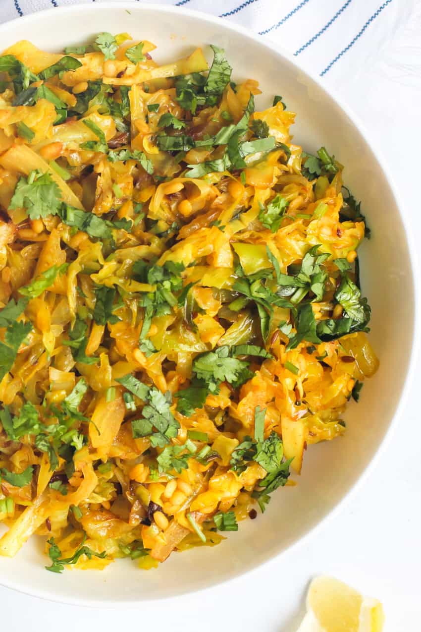 Patta Gobi subzi in a white bowl 